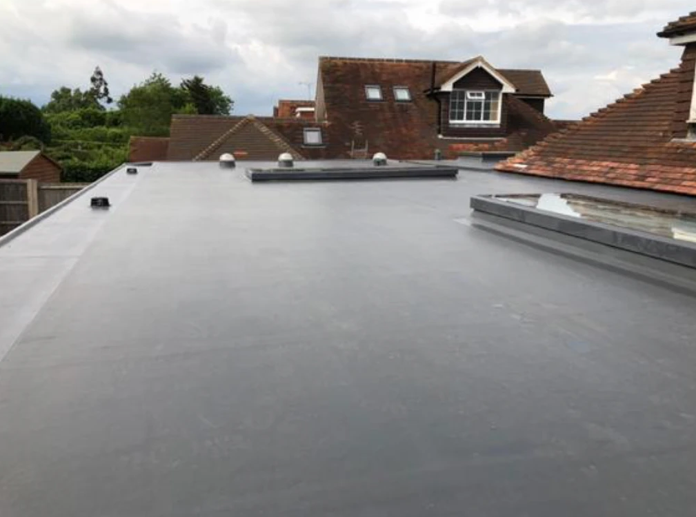 New rubber flat roof with roof lights on a Surrey home